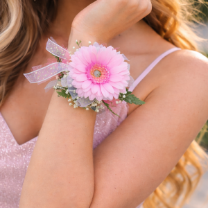 Single gerber daisy wristlet corsage with custom color accents for prom