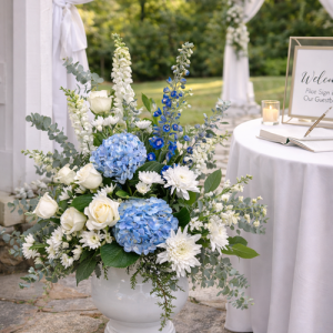 Wedding pedestal floral arrangement with hydrangea and roses for ceremony décor