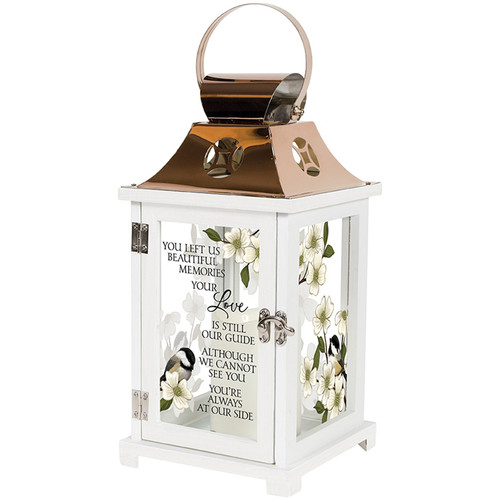 Elegant white sympathy lantern with LED candle and copper finish displayed near a sunny window, creating a comforting memorial display for remembrance and home décor.