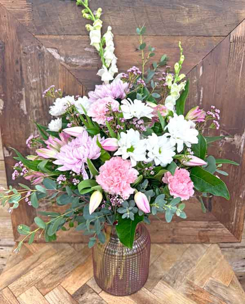 Tulip flower arrangement with pink carnations white daisies and candle gift set in vase